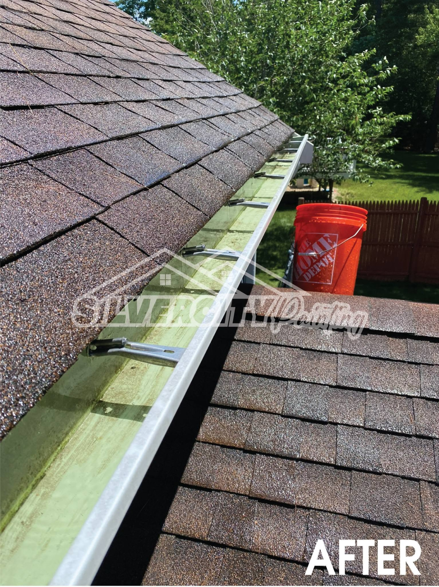 Clean, clear gutter flowing freely after professional gutter cleaning on a Taunton, MA home